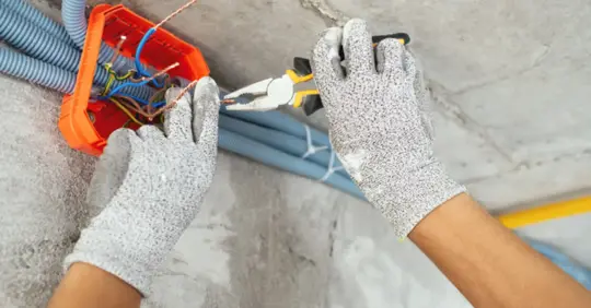 Electrician working on wiring